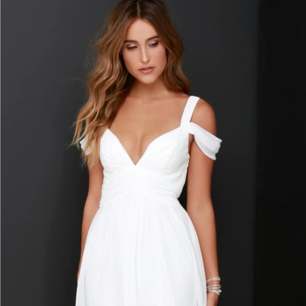 New. Never worn. Floor length